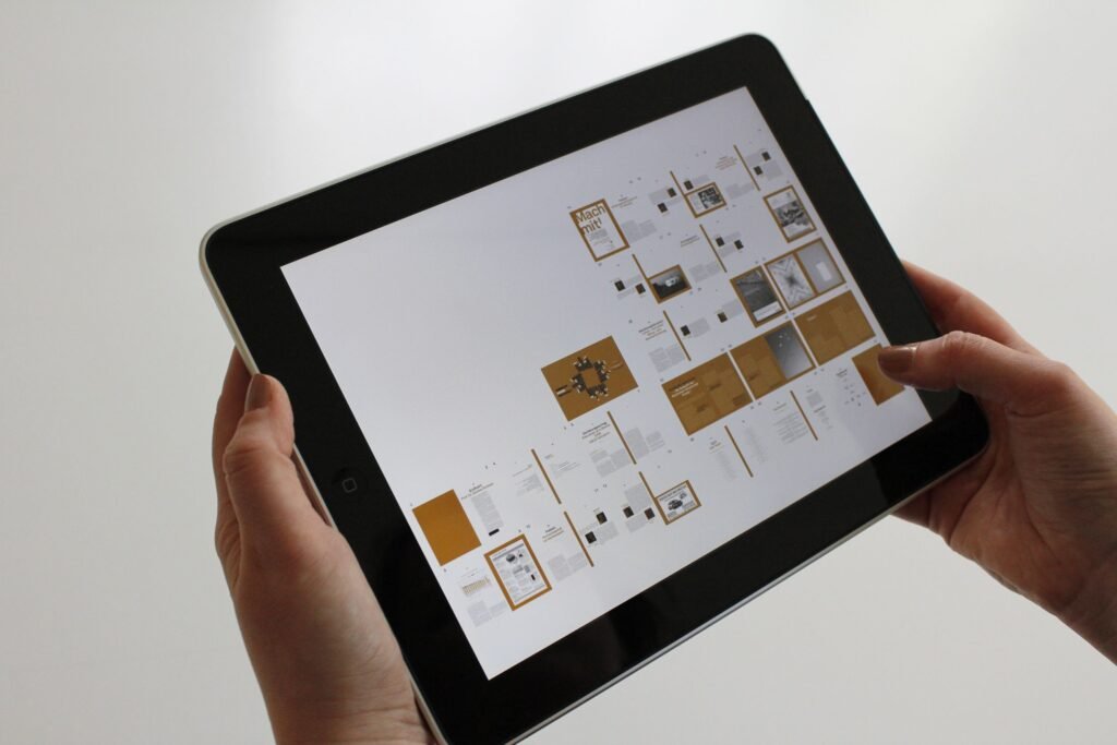 Hands using a tablet with a digital interface